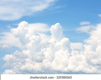 clouds in the blue sky - Shutterstock ID 329300363