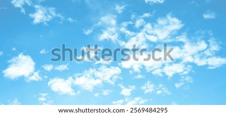 Clouds and blue sky in light windy weather. Calm and serene skyscape background photo.