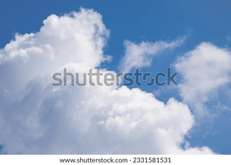 Clouds in the blue sky. Summer blue sky cloud gradient light white background. Beauty clear cloudy in sunshine calm bright winter air background. Image of beautiful blue sky.
