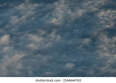 Clouds And Cloudscape During Sunset From Above In A Plane, Beautiful Sky Texture