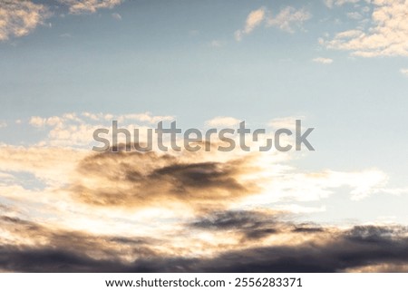clouds colored by the sunset
