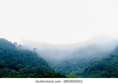 Clouds come down from the top of the mountain