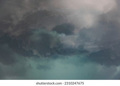 Clouds. Completely dark sky where storm clouds covered the city. Dramatic landscape. Dead. Disappeared. Wind. Hurricane. Storm. torrential. Storm. Rain. Conall. England. UK. Netherlands. Three.