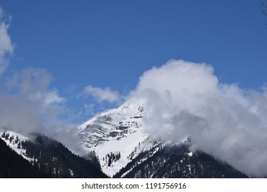 clouds covering mountain