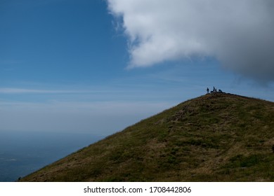 Clouds crawl over the mountain 