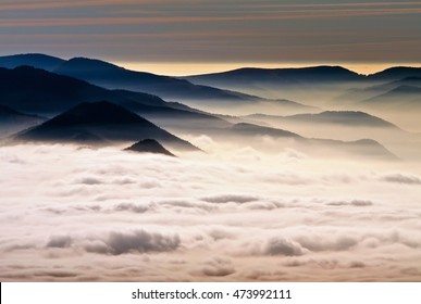 Clouds Drenched Valley Below The Level Of The Mountains. Sunrise Over The Stratus Cloud.