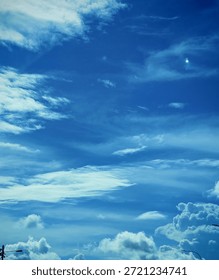 Clouds Drift Soft Above Sky