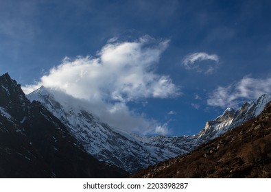 Clouds Emerging From The Mountain 