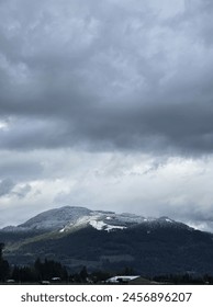 Clouds. Ice. Snow fall .Mountain 