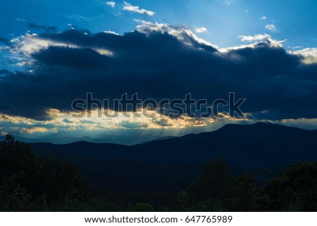 clouds with light beams