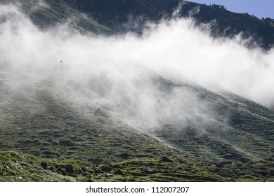 Clouds at a mountain