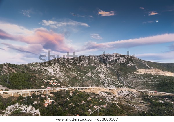 Clouds, mountains and infrastructure at the same\
moment in Croatia