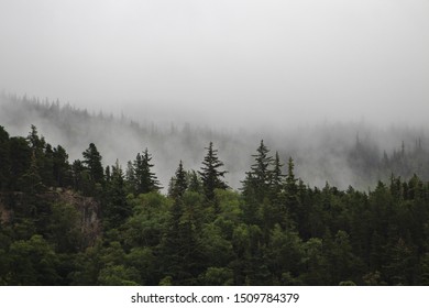 clouds moving over the mountains
