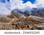 Clouds obscure the west face of Mera Peak seen from the Hinku Valley near village of Thagnak on route to Base camp of Mera Peak,a 6476 meter high peak in the Khumbu Himalayas,Nepal