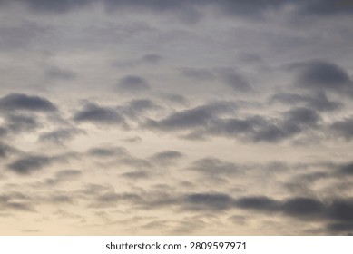 clouds obscuring the setting sun