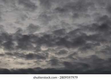 clouds obscuring the setting sun