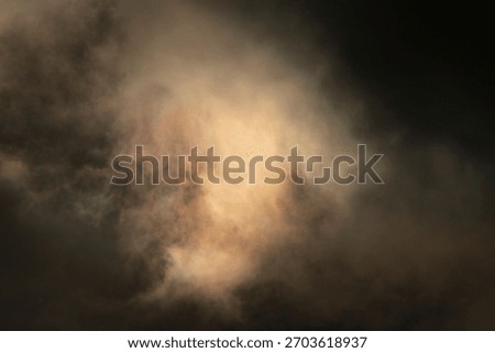 Clouds on fire behaving like a supernova in space or some intergalactic dust particle ready to give superpower to the carbon based organisms in its way.