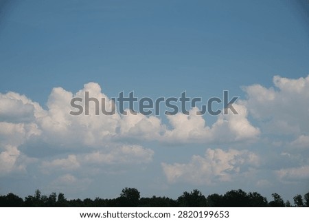 Clouds over the blue sky