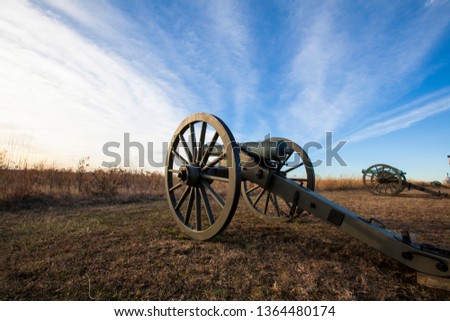 Clouds over cannons on the battlefield