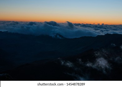 AM Clouds Over Mount Haleakala In Maui.