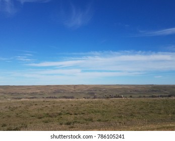 Clouds over an open field