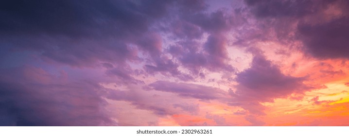 clouds and pink sky,sweet sky,Light pink clouds in sunset blue sky. Pastel colors of clouds, sunrise sundown natural background - Shutterstock ID 2302963261