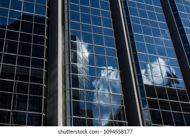 Clouds refection in glass