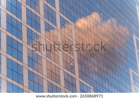 Clouds reflecting on the building