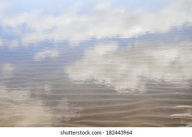 Clouds Reflection On A Water Pond In Santa Ana Beach, Near Juan Lacaze, Colonia, Uruguay