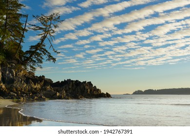 Clouds and reflections on Tonquin Beach, Tofino, British Columbia, Canada