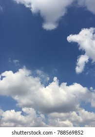 Clouds set against a bright blue sky - Shutterstock ID 788569852