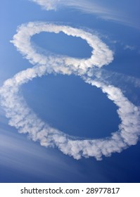 Clouds In Shape Of Figure Eight On Blue Sky