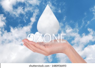 Clouds Shaped Like Drops Ozone Of Water In Woman Hands On Blue Sky Background 