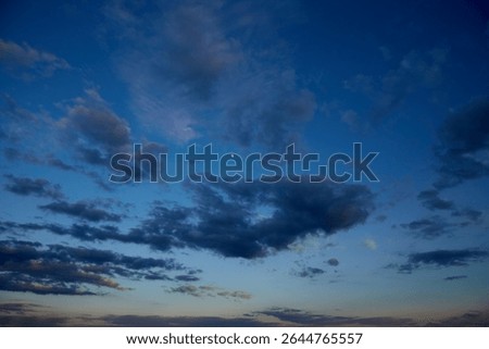 Clouds with sharply defined shadows and backlighting from the setting sun. A powerful visual effect of drama and expression.