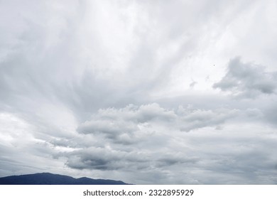Clouds in sky with mountain background