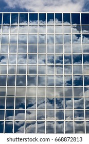 Clouds and sky reflected in windows