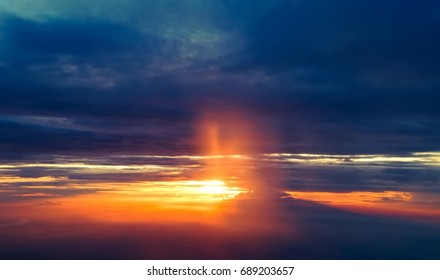 Clouds And Sky As Seen Through Window Of An Aircraft. Flying Over The Evening Timelapse Clouds With The Late Sun. Flight Through Moving Cloudscape With Beautiful Sun Rays.