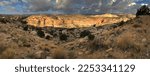 Clouds spread over buttes in a panoramic view of Escalante Grand Staircase National Monument, Garfield County, Utah