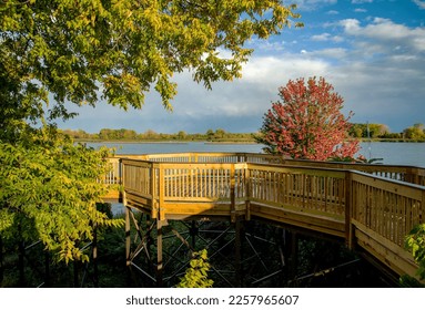 Clouds in summer heavenly sky over lake wooden deck overlook - Shutterstock ID 2257965607