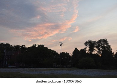 Clouds at sunset with trees