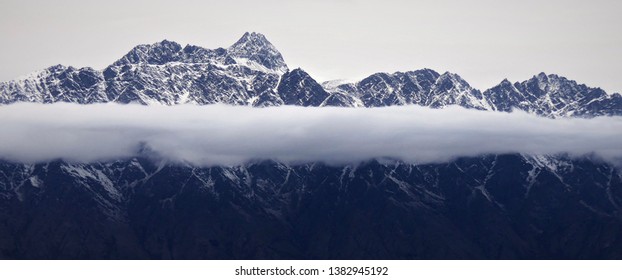 Clouds Through the Mountain Valley - Powered by Shutterstock - Get 15% off with code: PIKWIZARD15