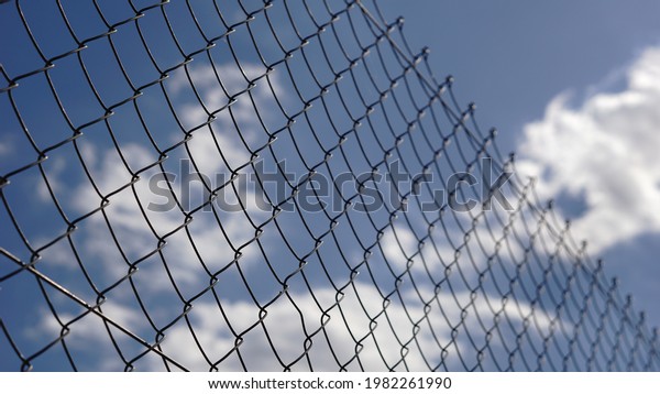clouds through wire mesh\
grid