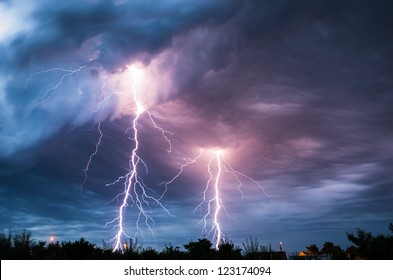 clouds and thunder lightnings and storm - Shutterstock ID 123174094