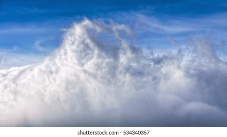 cloudscape with blue sky