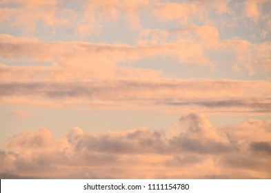 Cloudscape, Colored Clouds at Sunset near the Ocean