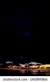 Cloudscape, Colored Clouds at Sunset near the Ocean
