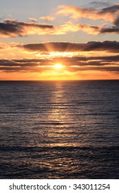 Cloudscape, Colored Clouds at Sunset near the Ocean