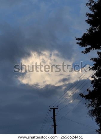 #cloudscape

#darkclouds

#lightclouds

#sunsetsky

#nature

#trees

#powerlines

#eveningmood
