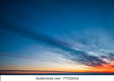 Cloudscape and dramatic orange sky, sunset shot