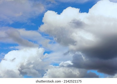 Cloudscape With Fluffy Cirrus And Some Blue Sky With Possible Storm 